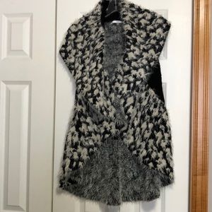 Black and white fuzzy sweater vest. Sz S/M